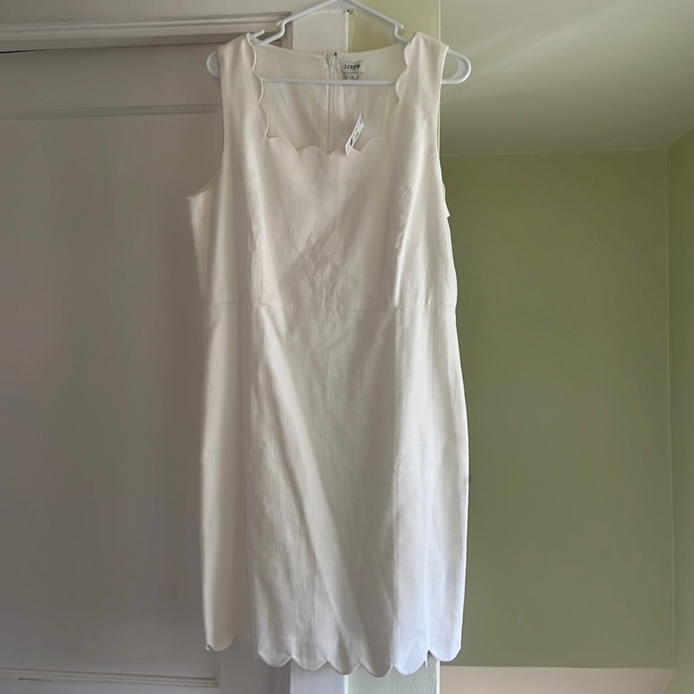 White scalloped edge dress.